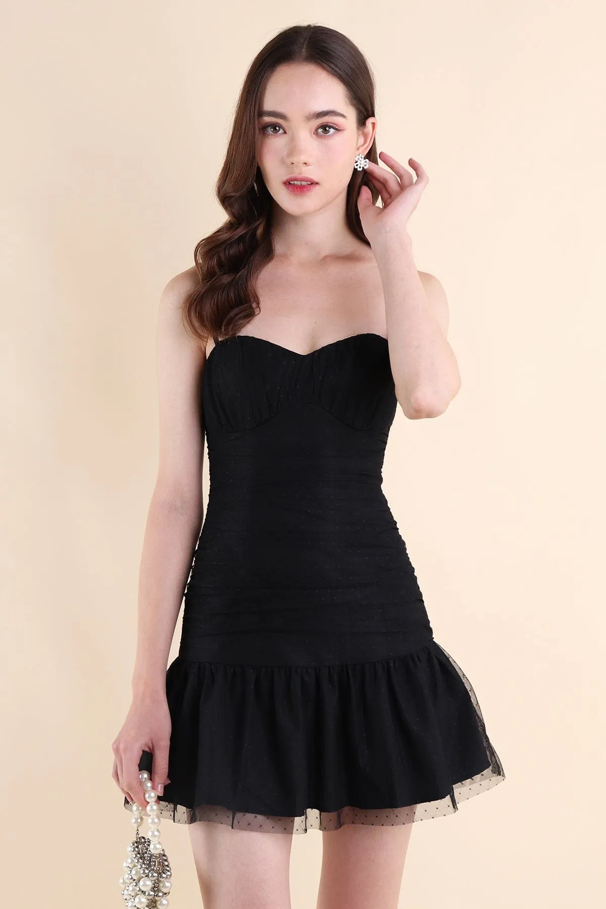 CORALIE SWISS DOT RUCHED DRESS IN BLACK