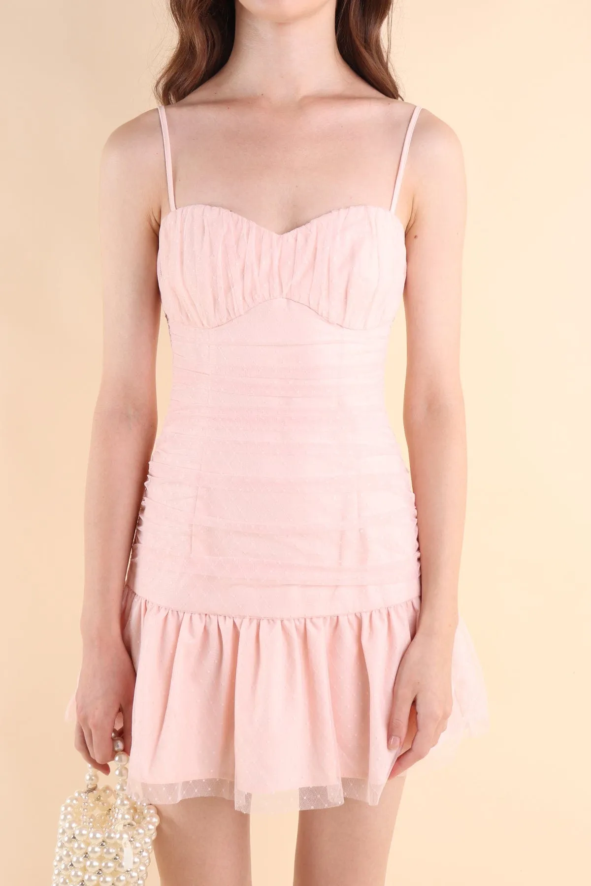 CORALIE SWISS DOT RUCHED DRESS IN PINK