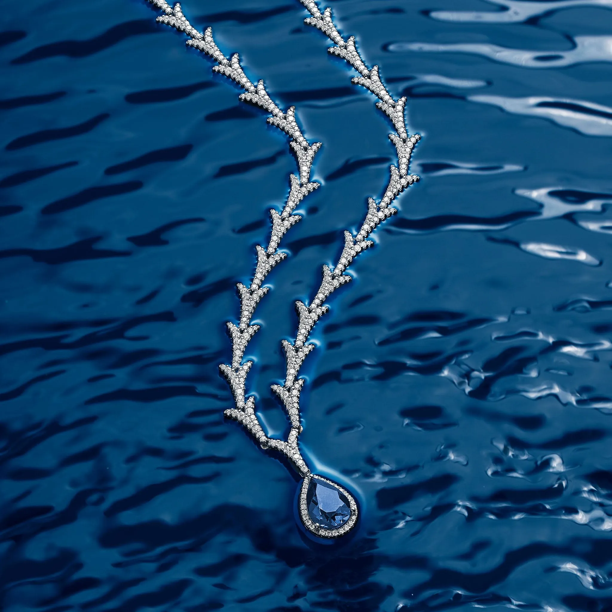Dragon Tail Necklace with Blue Pear Pendant