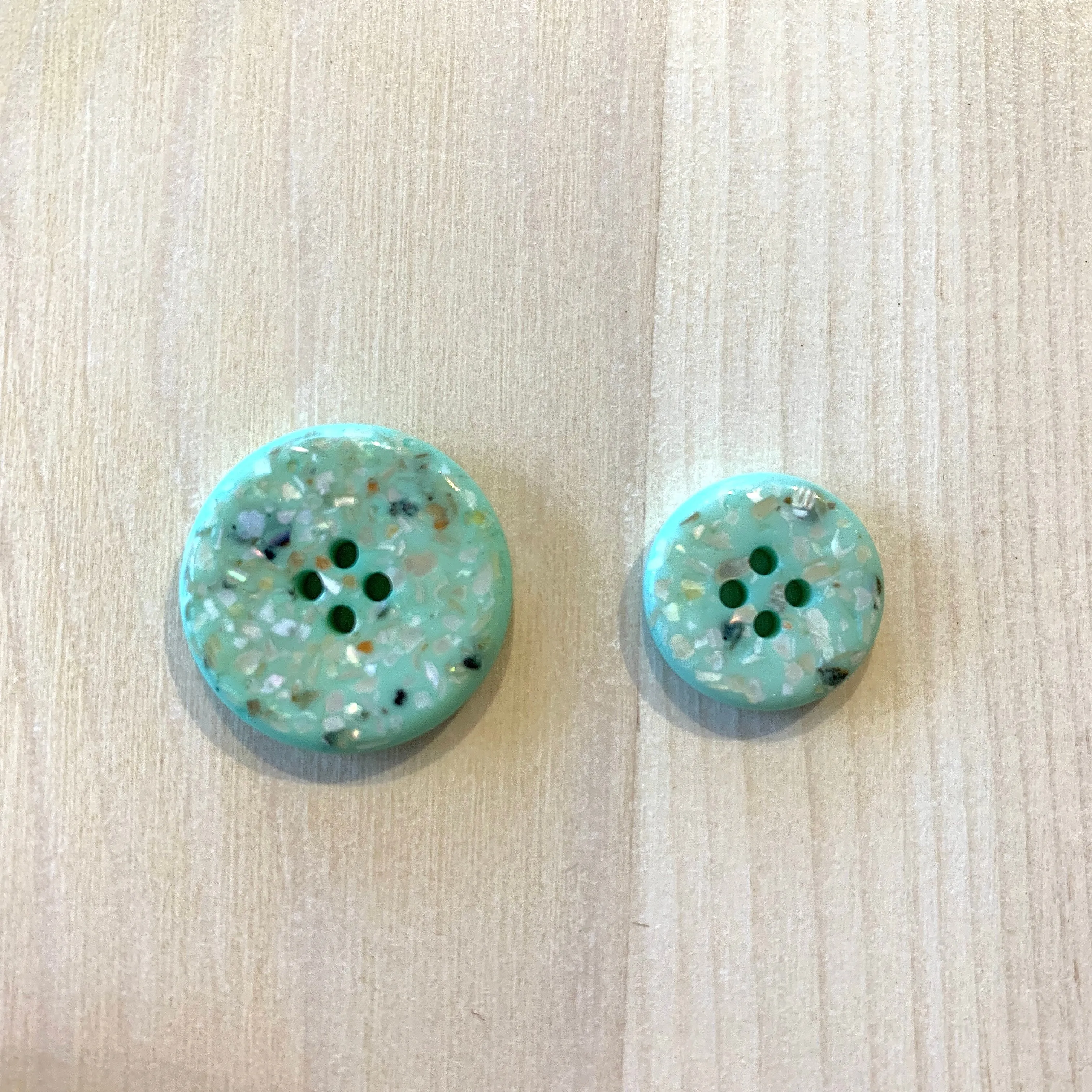 Recycled polyester buttons