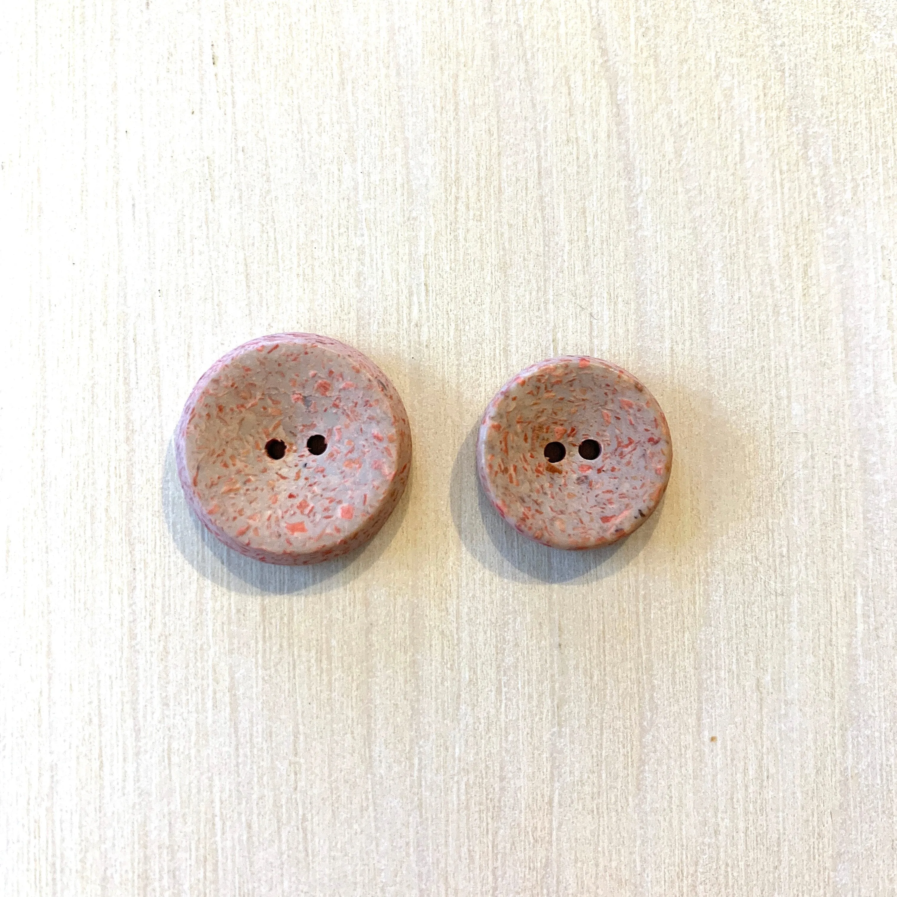 Recycled polyester buttons