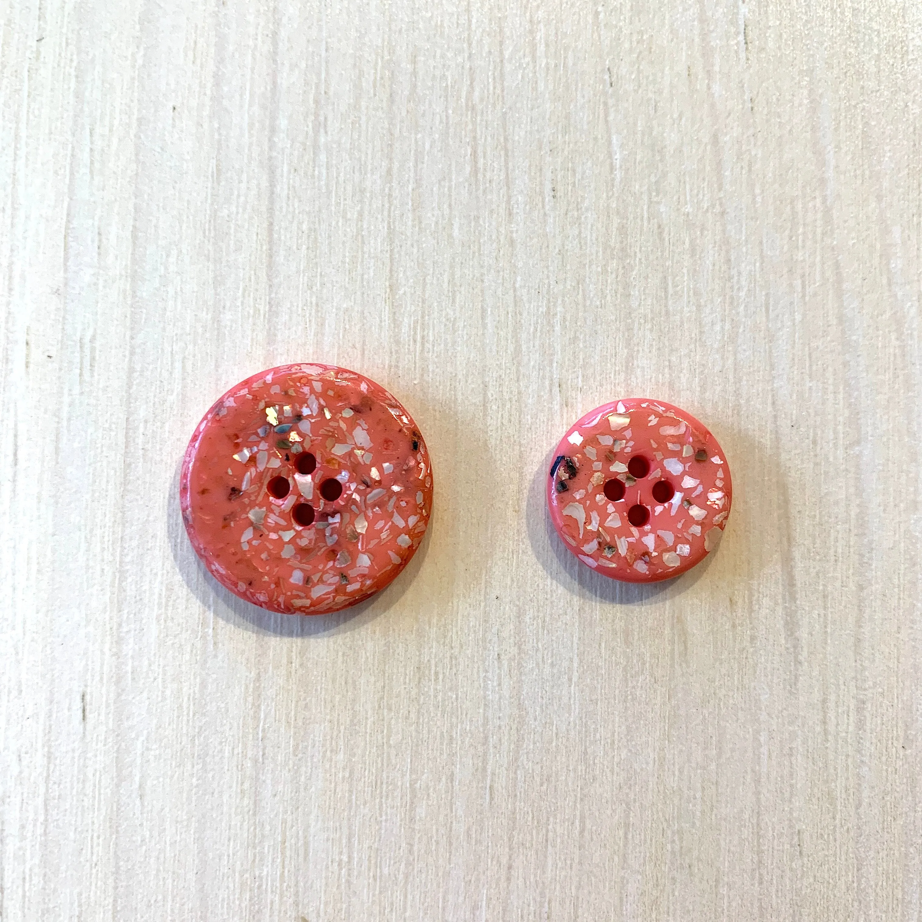 Recycled polyester buttons