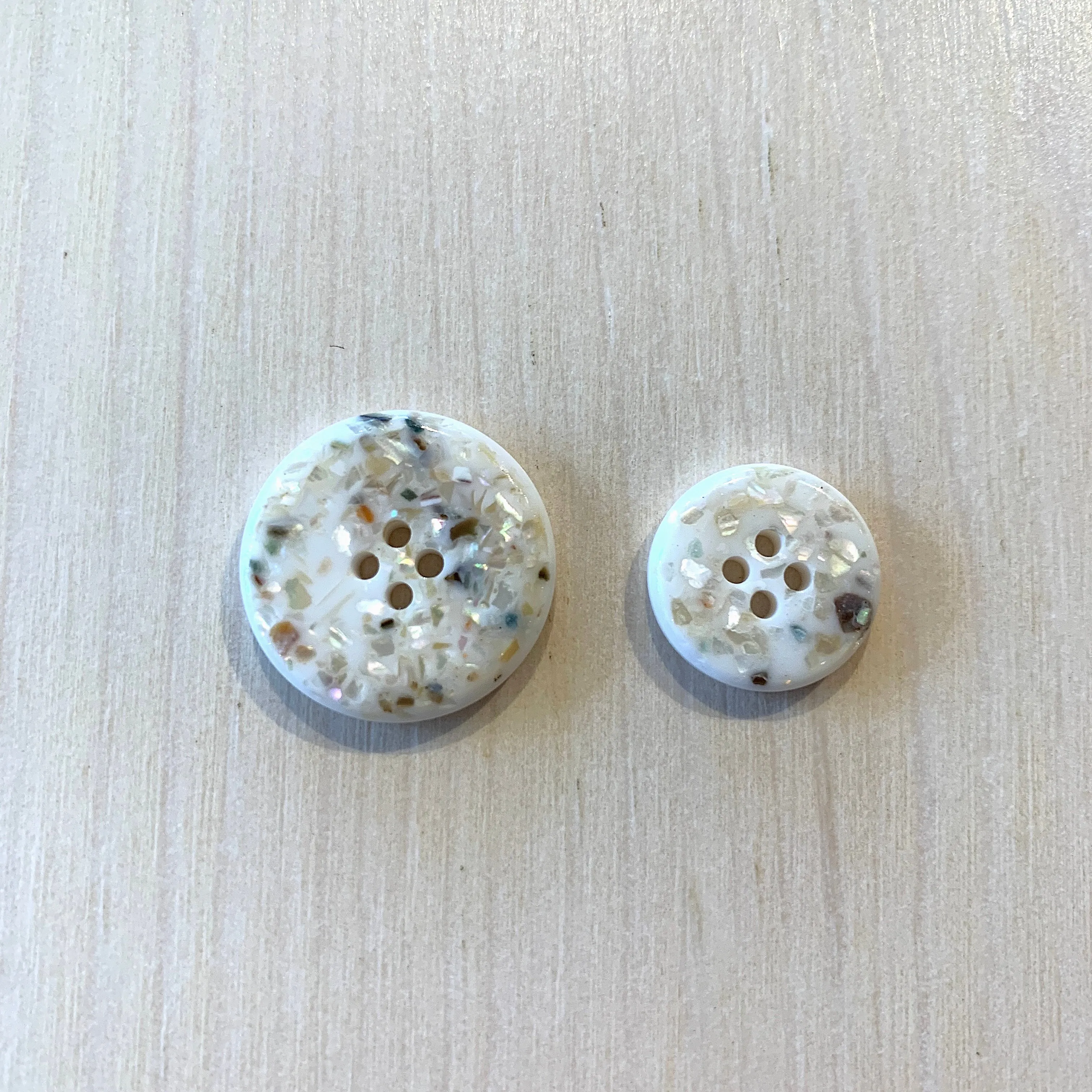 Recycled polyester buttons